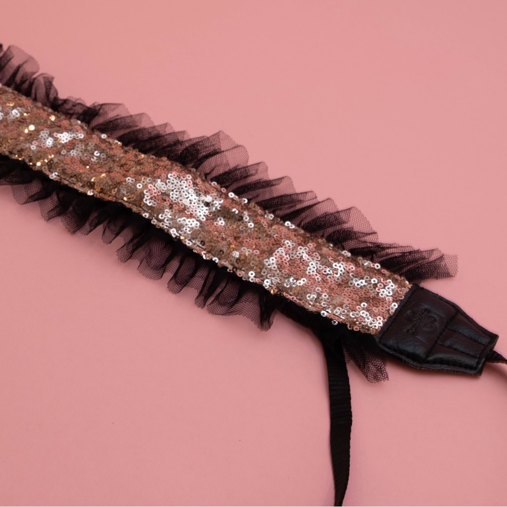 Beautiful champagne sequin camera strap with black ruffle.